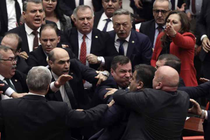 Brawl in Turkey's parliament after MP criticises Erdogan